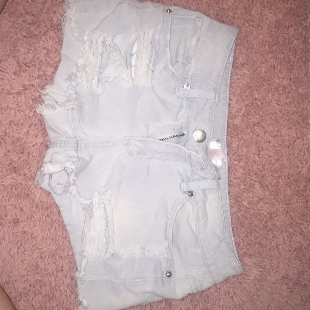 No Boundaries ripped blue jean shorts.